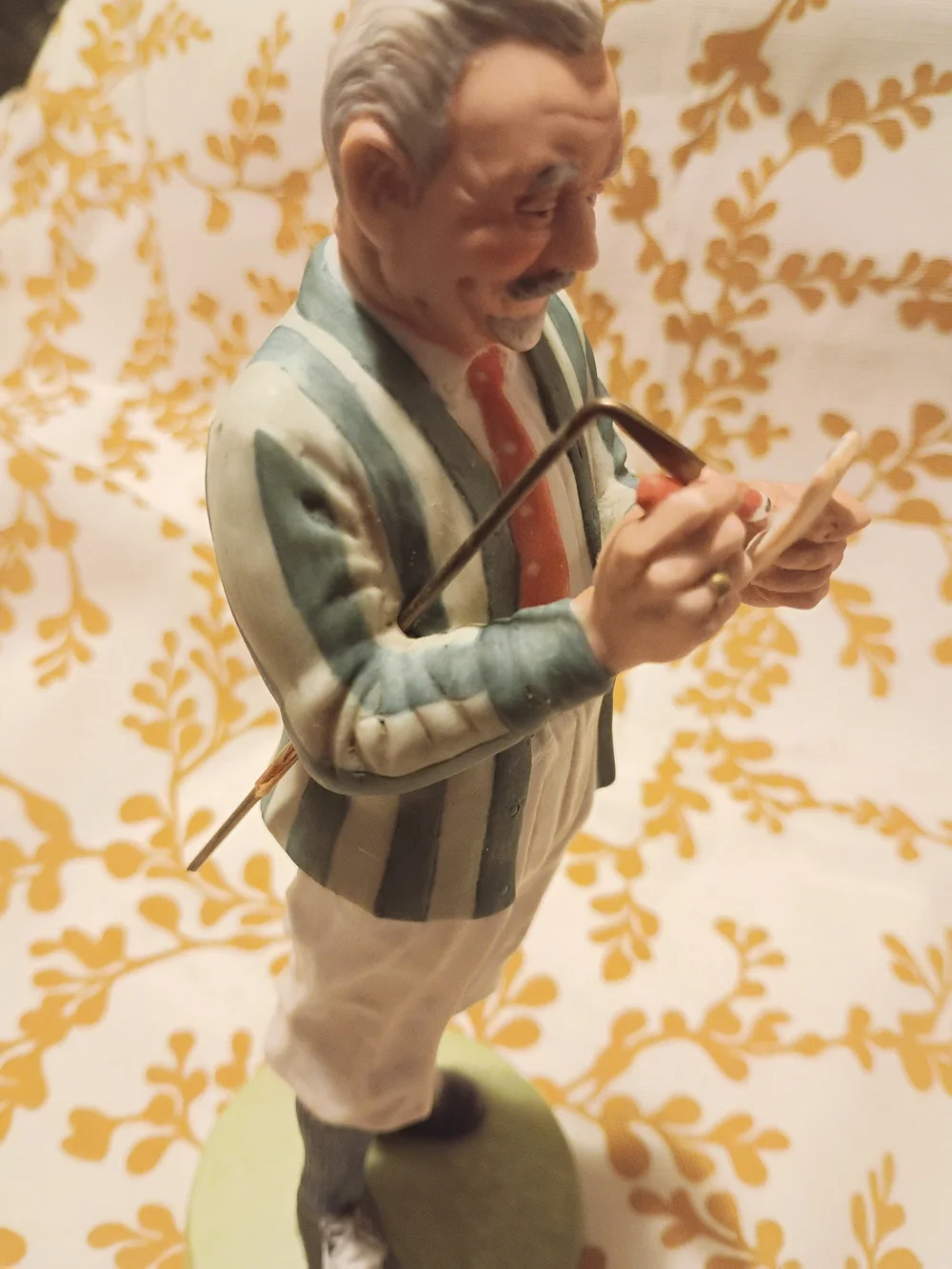 Norman Rockwell Ceramic Figurine in Cream and Green
